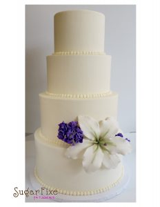 4 tier lily stock buttercream cake